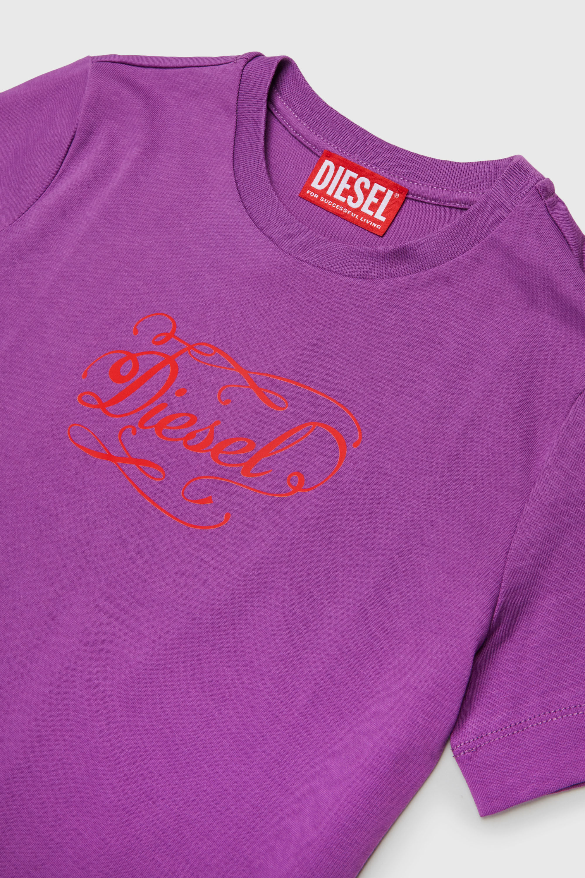 Diesel - TORSAL, Woman's Cotton T-shirt with whimsical logo print in Violet - 3