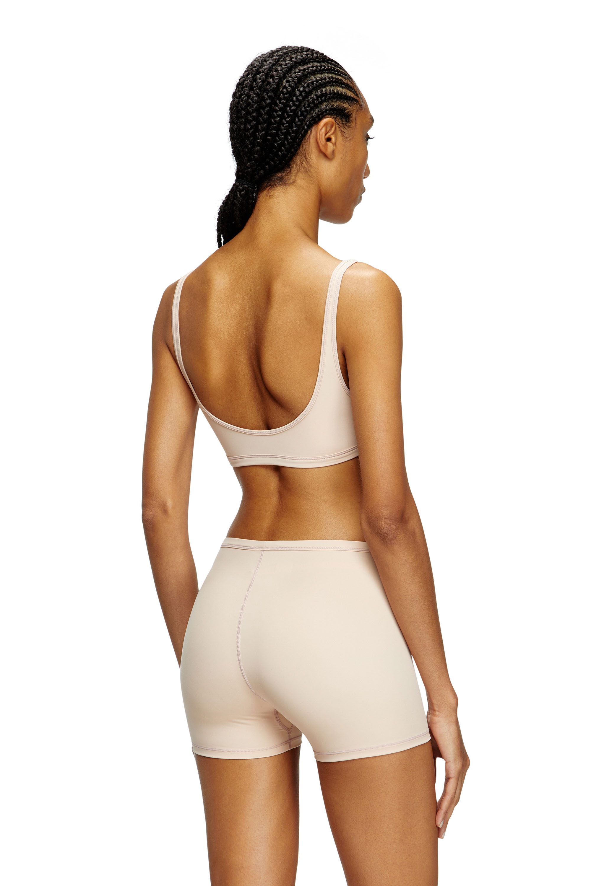 Diesel - CHELSEA-UTLT, Woman's Sports bra with cut-out logo in Nude - 4